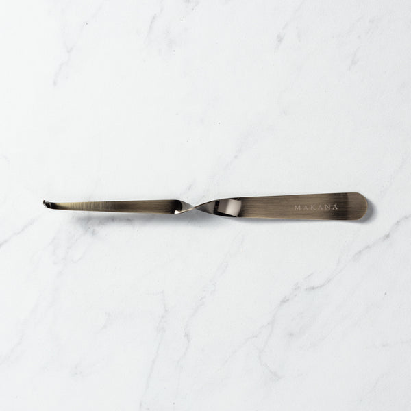 Makana brass wick dipper for candles